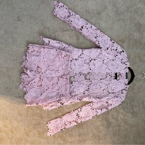 Mauve colored blazer with high waisted shorts
